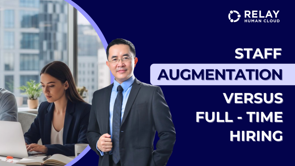 A professional man in a suit in the foreground and a person working on a laptop in an office background. The text ‘Staff Augmentation Versus Full Time Hiring’ appears on a dark blue background with the Relay Human Cloud logo in the top-right corner.